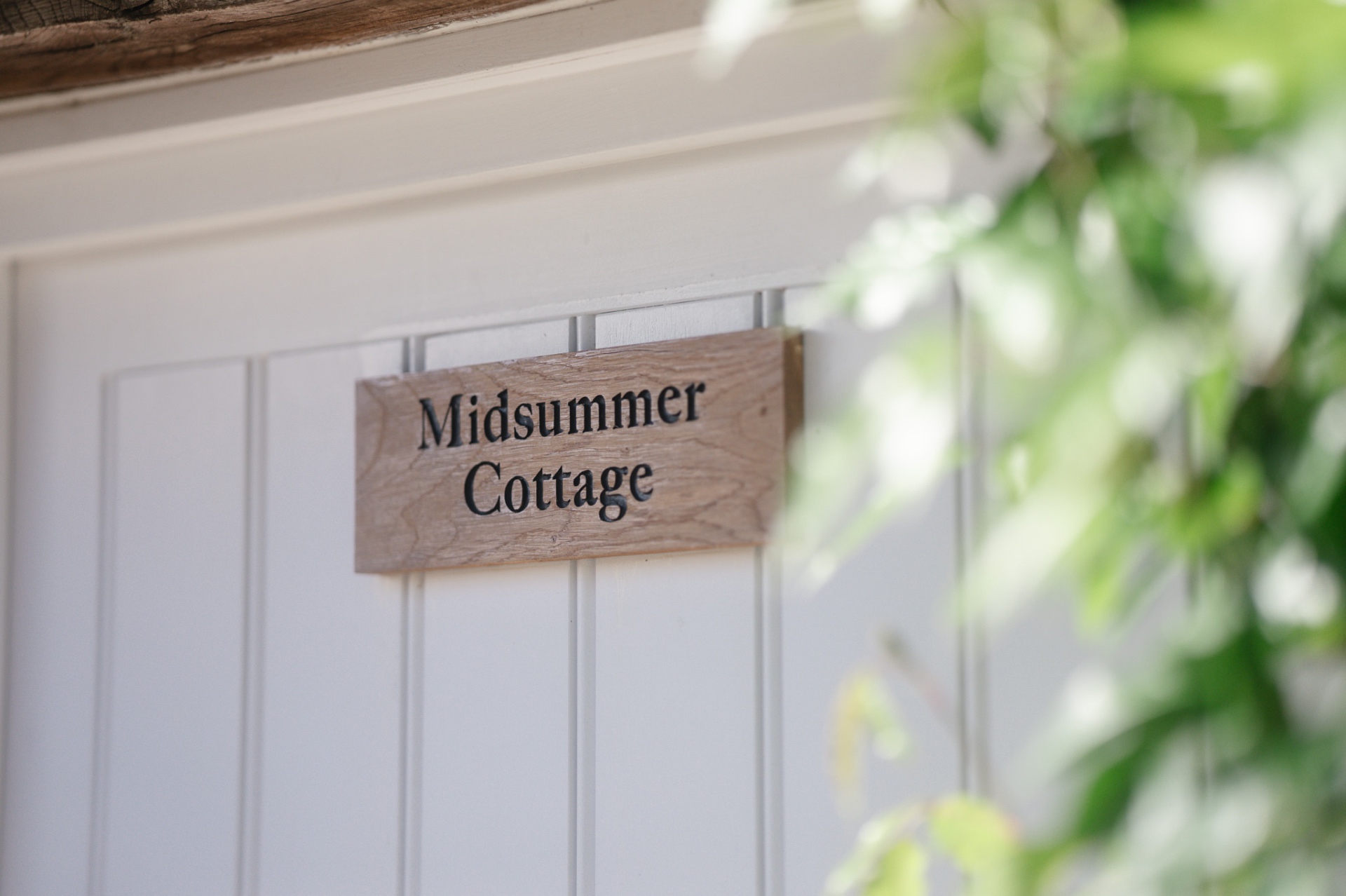 Midsummer Cottage bridal suite sign at the wedding venue, wedding photography Worcestershire & Midlands